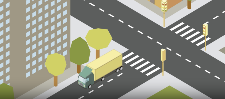 Aerial view of a city intersection with cars, a yellow truck, trees, pedestrian crosswalks, and city buildings in an isometric drawing style.